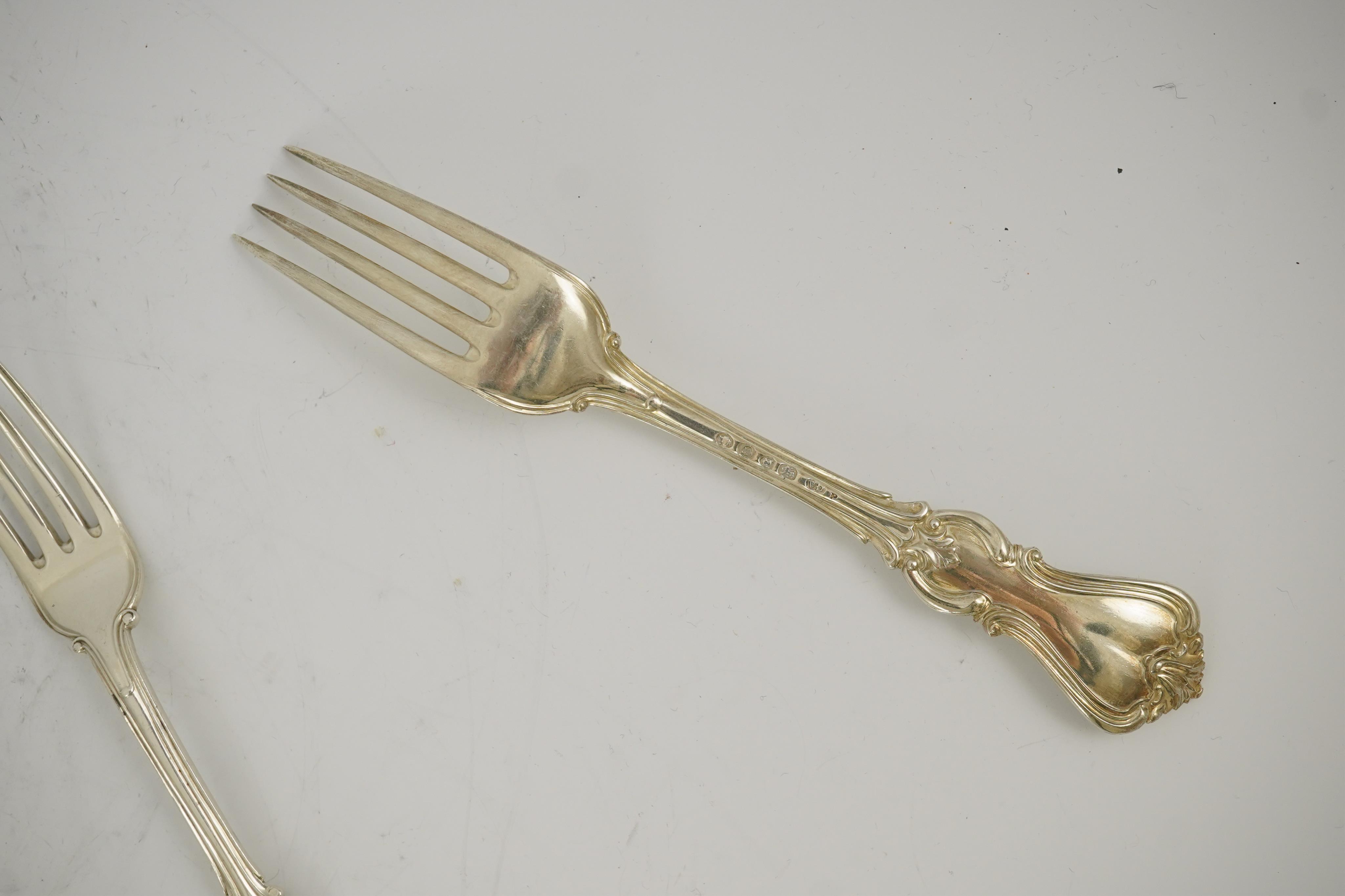 Twenty four items of Victorian silver double struck Prince Albert pattern flatware by George Adams